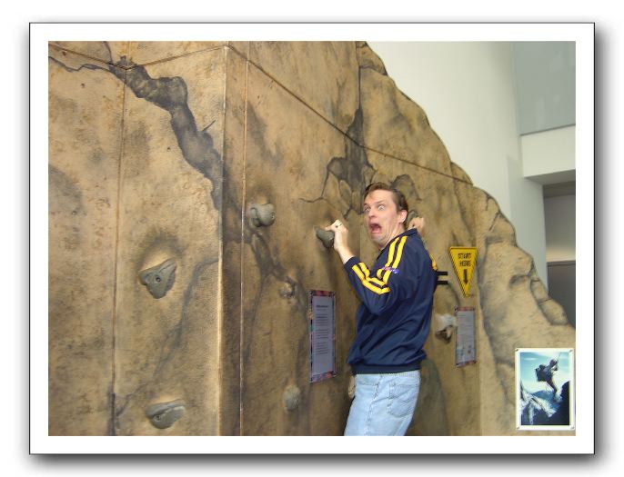 Ben climbing the wall at Seattle's Pacific Science Center