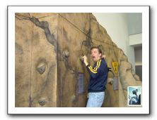 Ben climbing the wall at Seattle's Pacific Science Center